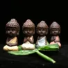 Små Buddha - keramisk staty - munkfigurin