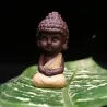 Pieni buddha - keraaminen patsas - munkki figuriini