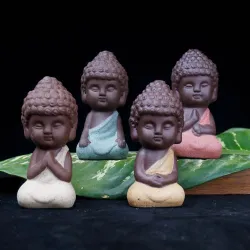 Piccolo Buddha - statua in ceramica - statuetta monaca