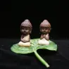Små Buddha - keramisk staty - munkfigurin