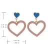 AretesPendientes largos con forma de corazón