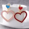AretesPendientes largos con forma de corazón