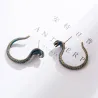 Vintage örhängen med cobra