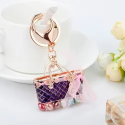 Kristallväska - guld keychain