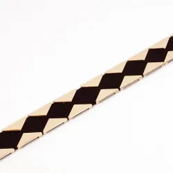 Elegant elastisk bälte med gyllene trianglar