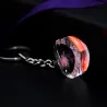 Ruusukukkia kristallisessa sydämessä - LED - keychain