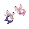 Brooches blu farfalla rosa