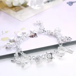 Elegantti ranneke 13 charmia - 925 sterling hopeaa