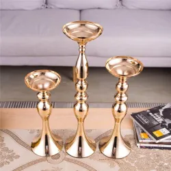 Velas y CandelabroSoportes de vela de oro - Candelero