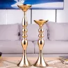 Velas y CandelabroSoportes de vela de oro - Candelero