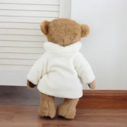 Animales de pelucheoso de peluche con abrigo blanco - juguete