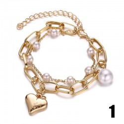 Elegant bracelet with charms & pearls
