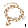 PulseraPulsera elegante con encantos & perlas