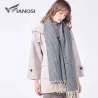 Elegant warm scarf with tassels