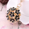 Hollow-out kristallblomma - keychain