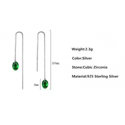 Långa silverörhängen med grön zirconia