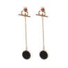 Chain with a black circle - long earrings