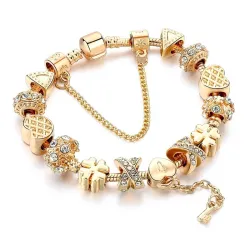 PulseraPulsera de oro de moda con dijes - corazones - abalorios - trébol - llave