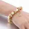 Bracciale in oro alla moda con ciondoli - cuori - perline - trifoglio - chiave