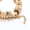 PulseraPulsera de oro de moda con dijes - corazones - abalorios - trébol - llave