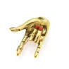 Hand with "Love" gesture - red nails - punk brooch