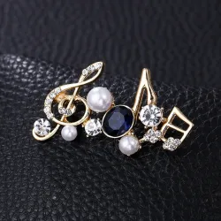 Musical notes - crystal brooch