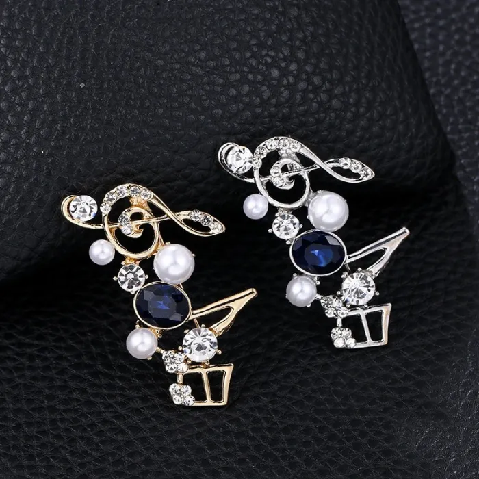 Musical notes - crystal brooch