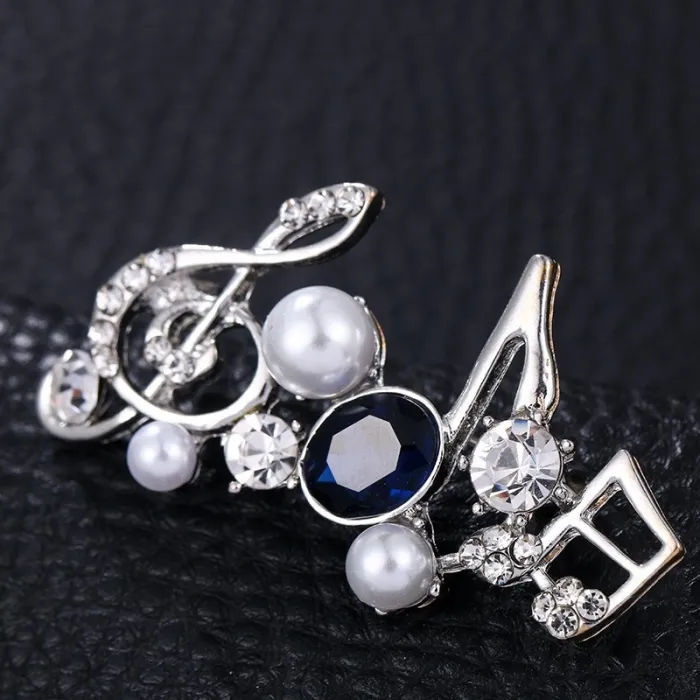 Musical notes - crystal brooch