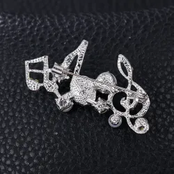 Musical notes - crystal brooch