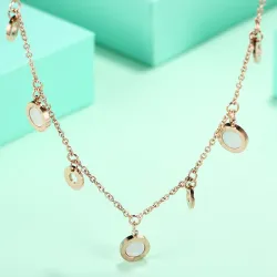 Gold necklace - with round charm decorations