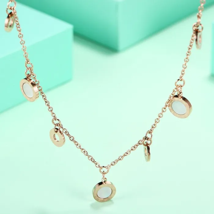 Gold necklace - with round charm decorations