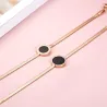 Roségouden armband - zwarte ronde hanger met Romeinse cijfersArmbanden