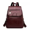 Leather backpack - with hand strap / front zipper