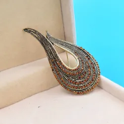 U-shaped brooch - with crystal decorations