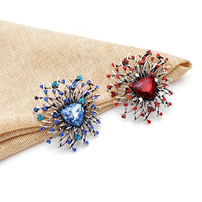 Glanzende bloemenbroche - met kristallenBroches