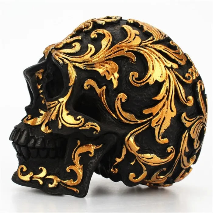 Zwart doodshoofd - met gouden gravures - beeld van harsHalloween & feest