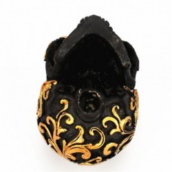 Black skull head - with golden carvings - resin statue