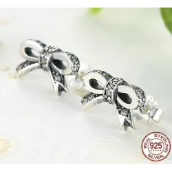 Kristallen strikknoop - sieradenset - halsketting / oorbellen / ring - 925 sterling zilverHalskettingen