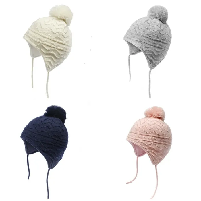 Stickad mössa - med öronskydd / pom pom - för tjejer / pojkar