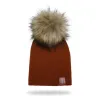 Berretto lavorato a maglia con pom pom / etichetta in pelle - unisex - per bambini / adulti