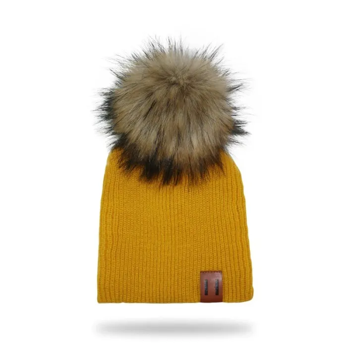 Stickad mössa med pom pom / läder etikett - unisex - för barn / vuxna