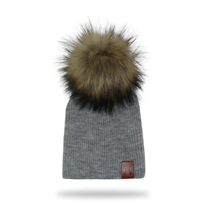 Stickad mössa med pom pom / läder etikett - unisex - för barn / vuxna