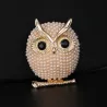 Crystal brooch with pearl owl