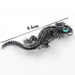 Vintage brooch with crystal lizard