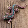 Vintage brooch with crystal lizard