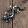 Vintage brooch with crystal lizard