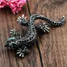 Vintage brooch with crystal lizard