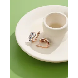 Infinity style earrings - with blue cubic zircon