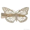 Haarspange mit goldenem Schmetterling
