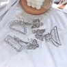 Vintage vlindervormige haarclip - met kettingHaarspelden